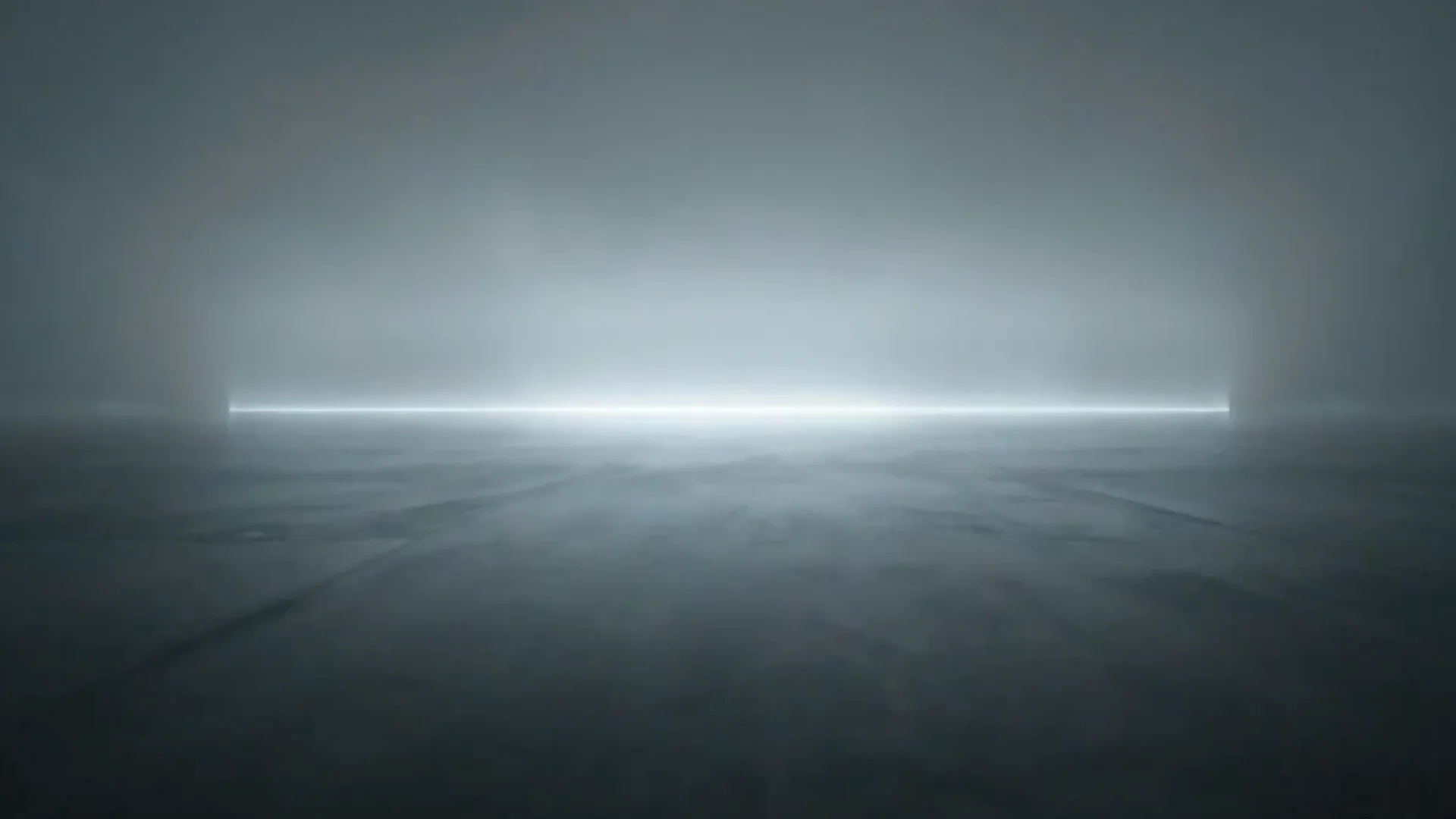 A luminous horizon in a misty blue field